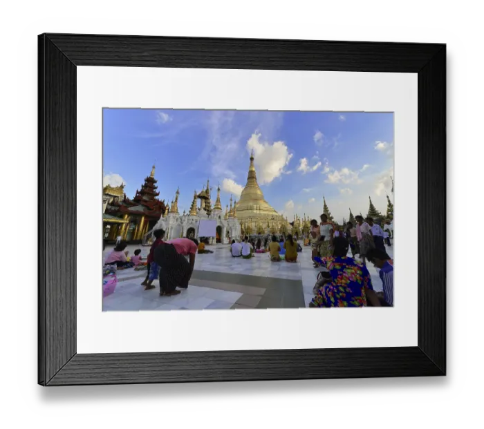 Framed Print : Believers gather in a large square in front of a golden pagoda