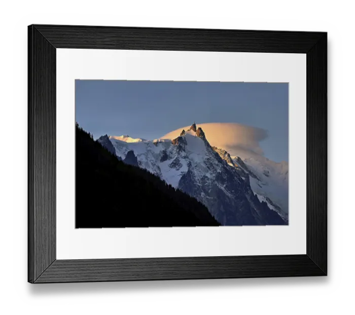 Framed Print : Aiguille du Midi with sun-lit cloud above the summit Framed Print : Aiguille du Midi with sun-lit cloud above the summit