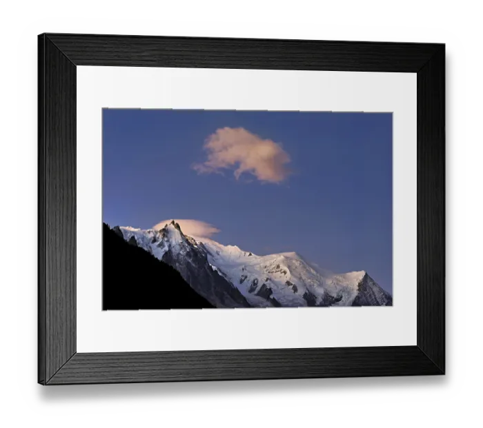 Framed Print : Aiguille du Midi snow-covered from left with sun-lit cloud over the summit Framed Print : Aiguille du Midi snow-covered from left with sun-lit cloud over the summit
