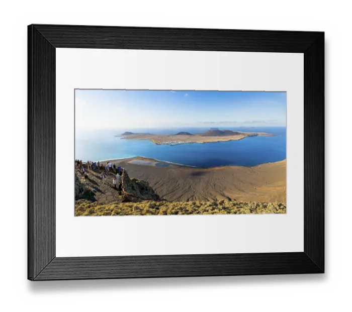 Framed Print : View of La Graciosa island with volcanic craters in the evening light