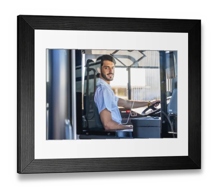 Framed Print : Young man working as a bus driver Framed Print : Young man working as a bus driver