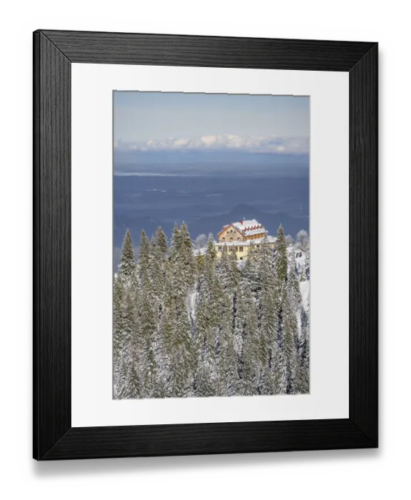 Framed Print : Snowy forest and Kreuzeckhaus mountain hut in the Garmisch Classic ski area in winter