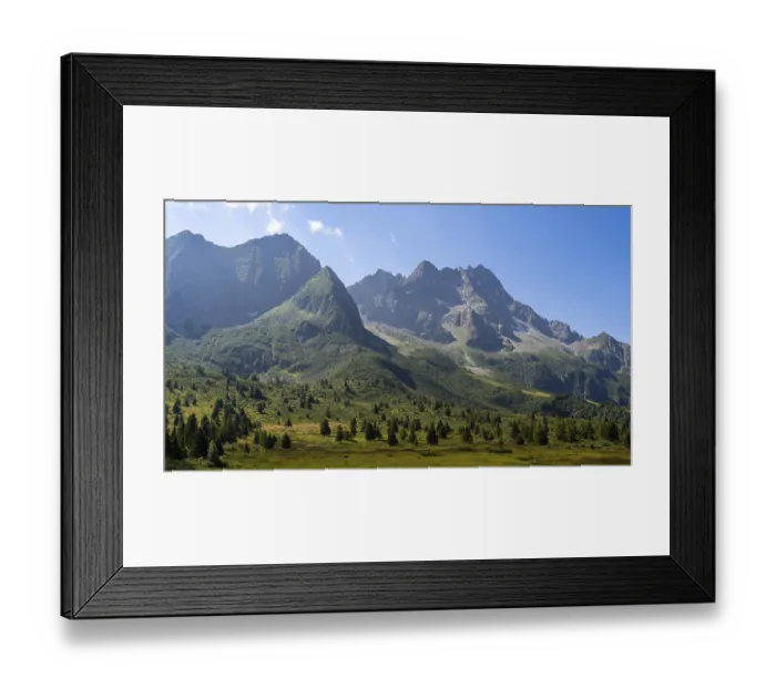 Framed Print : A breathtaking view of a towering mountain range with rugged peaks