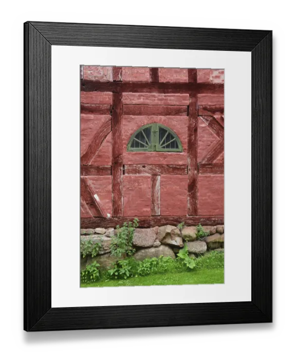 Framed Print : Green window in a wall in a red half-timbered house in Den gamle by