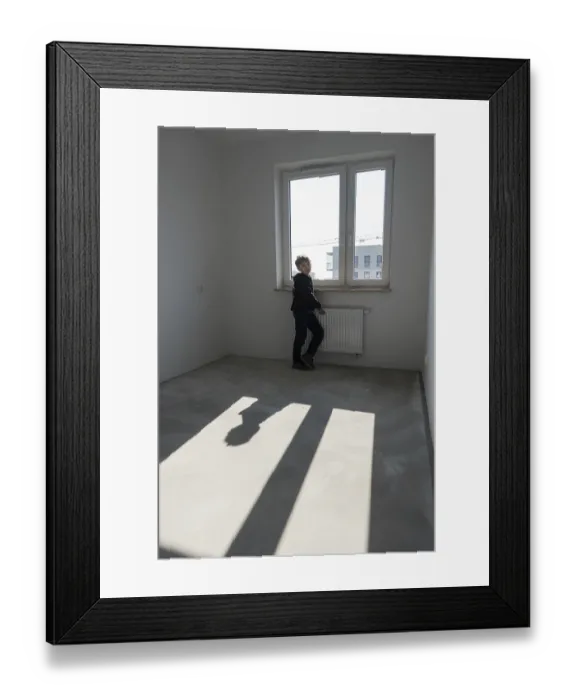 Framed Print : Happy young boy in his new empty room in the new flat in Wroclaw Framed Print : Happy young boy in his new empty room in the new flat in Wroclaw