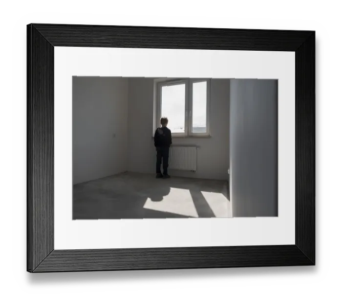 Framed Print : Happy young boy in his new empty room in the new flat in Wroclaw Framed Print : Happy young boy in his new empty room in the new flat in Wroclaw
