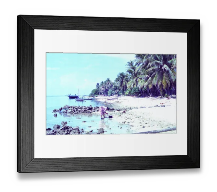 Framed Print : Maldives: Local woman on less idyllic beach Framed Print : Maldives: Local woman on less idyllic beach