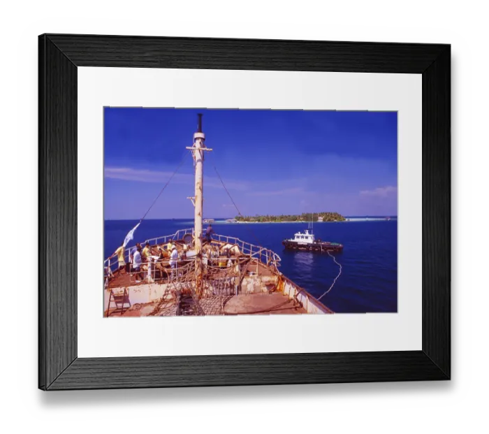 Framed Print : Male: A red freighter is sunk off Makafushi Island to form the basis for a coral reef