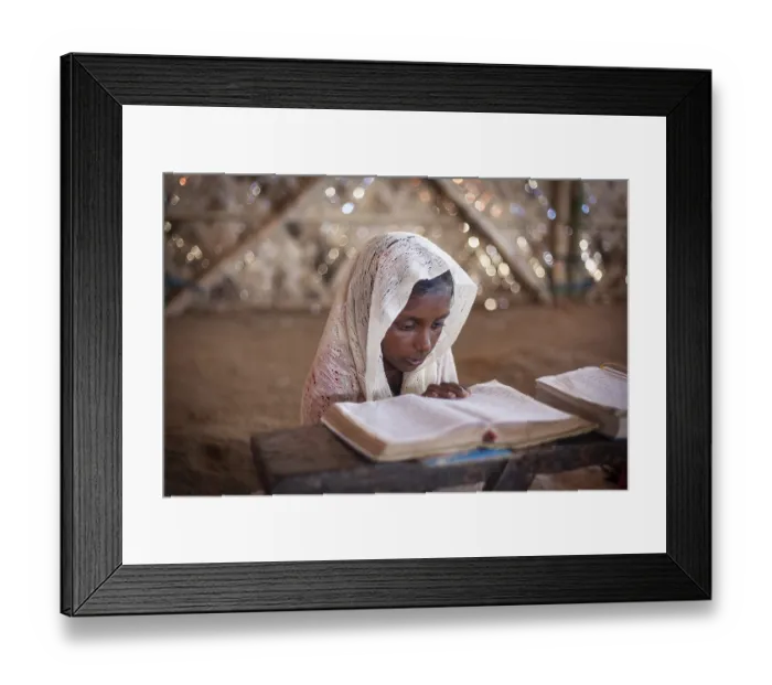 Framed Print : Girl reading in a madrasah, Koran school Framed Print : Girl reading in a madrasah, Koran school