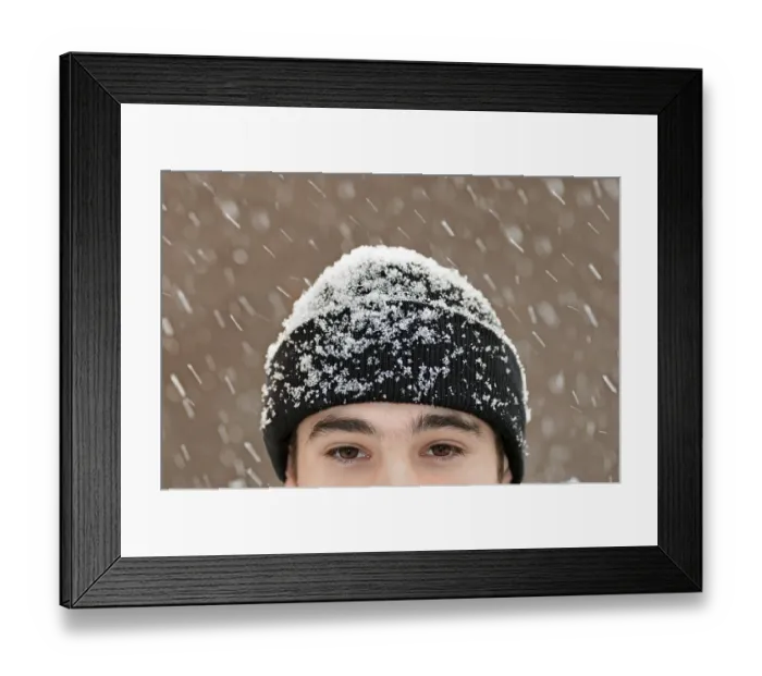 Framed Print : Man wearing a woolen hat in snow Framed Print : Man wearing a woolen hat in snow