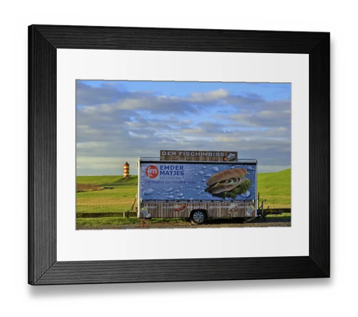 Framed Print : Closed fish snack car stands on the car park in front of the Pilsum lighthouse