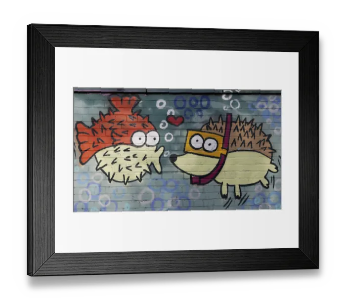 Framed Print : Spiny fish figure kissing a hedgehog figure wearing goggles