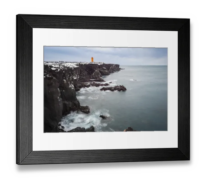 Framed Print : Orange lighthouse Ondverdarnes stands on a dark cliff Framed Print : Orange lighthouse Ondverdarnes stands on a dark cliff