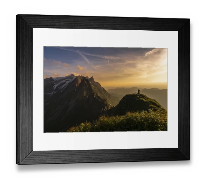 Framed Print : Photographer on grassy ridge at sunset with Santis peak in the background