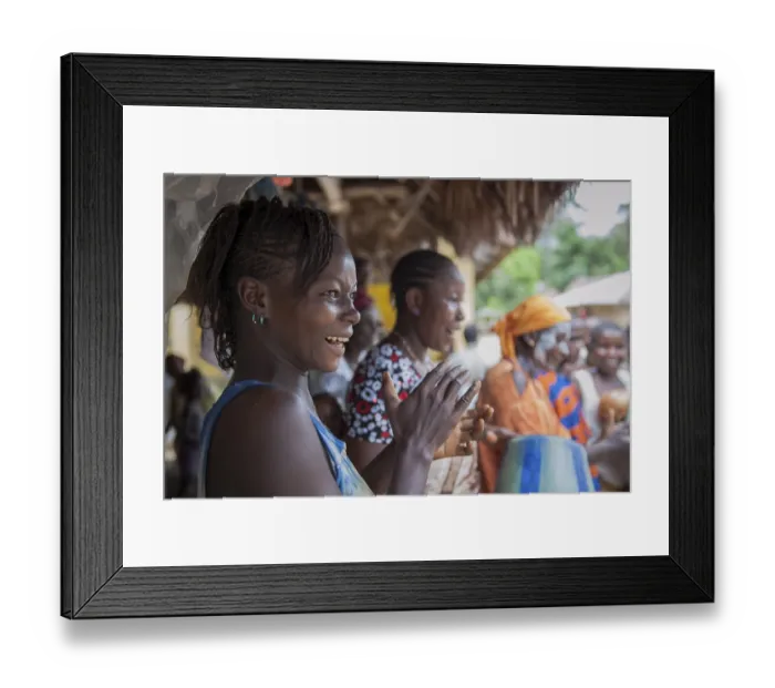 Framed Print : Villagers celebrating a festival with traditional dance and music