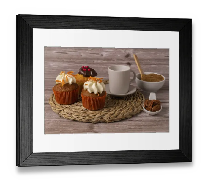 Framed Print : Assortment of chocolate and cream and carrot cupcakes on various backgrounds