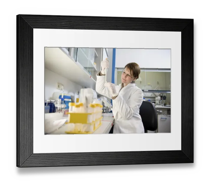 Framed Print : Laboratory assistant at the Robert Koch Institute
