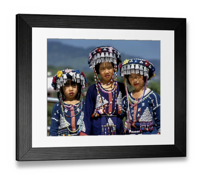Framed Print : Three Lisu girls wearing colourful headdresses and the traditional costume of the mountain people Framed Print : Three Lisu girls wearing colourful headdresses and the traditional costume of the mountain people