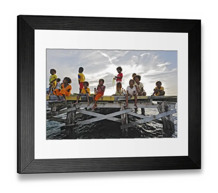 Framed Print : Children on a jetty, Arborek, Raja Ampat