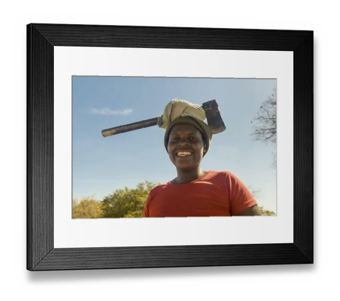 Framed Print : Woman wearing ax on her head, Thohoyandou