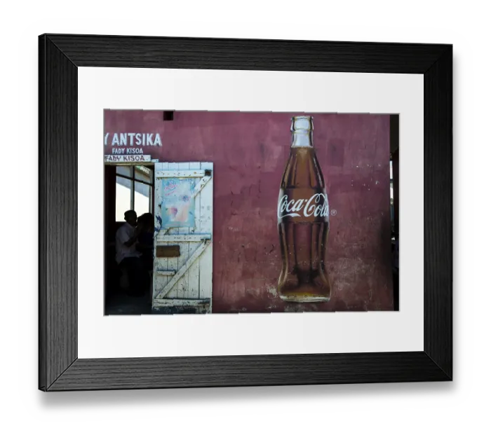 Framed Print : Coca Cola advertising and the open door of a restaurant Framed Print : Coca Cola advertising and the open door of a restaurant