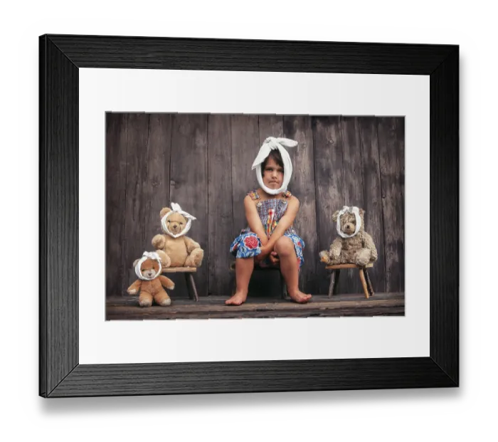 Framed Print : Four-year girl and teddy bears with toothache