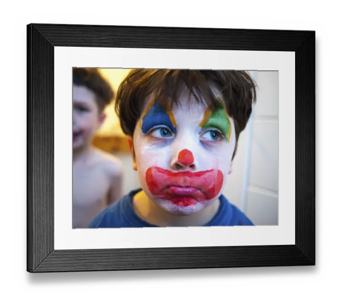 Framed Print : Child with a clown makeup, Germany