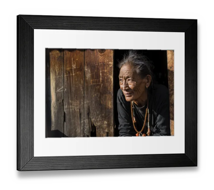 Framed Print : Senior female farmer looking out of a window Framed Print : Senior female farmer looking out of a window