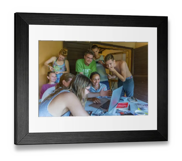 Framed Print : German Teenagers sitting in front of laptop