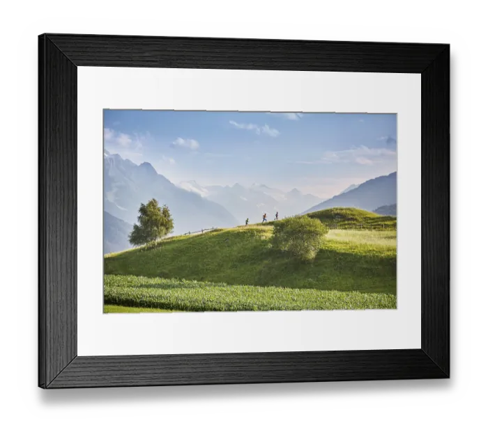 Framed Print : Woman and two men running up hill