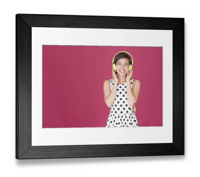 Framed Print : Smiling woman listening to music on headphones Framed Print : Smiling woman listening to music on headphones