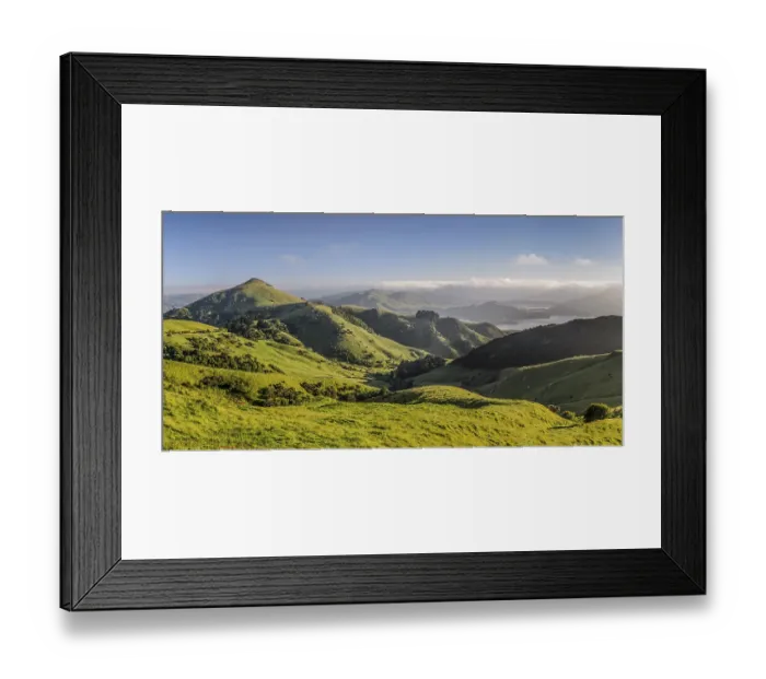 Framed Print : Green hilly grasslands with view of Hoopers Inlet
