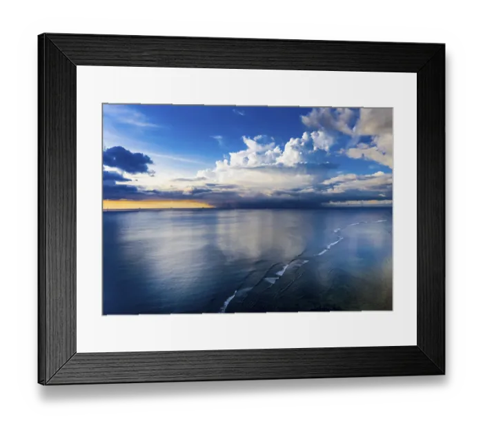 Framed Print : Aerial view, sunset, rain cloud over the sea on the horizon Framed Print : Aerial view, sunset, rain cloud over the sea on the horizon