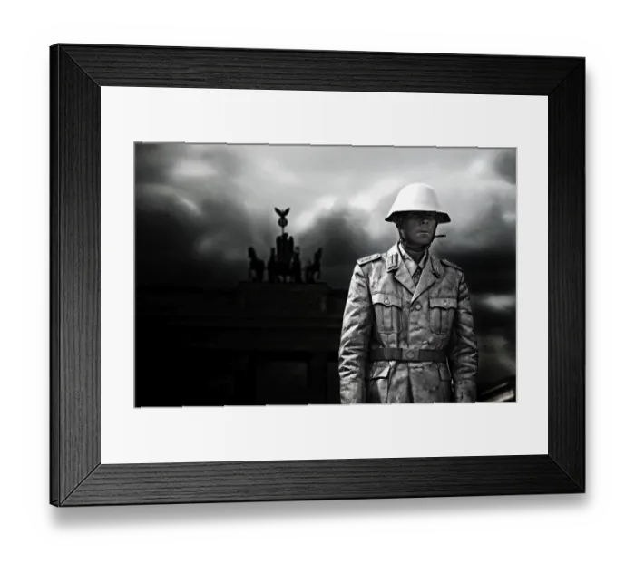 Framed Print : Man dressed as NVA soldier, in front of Brandenburger Gate