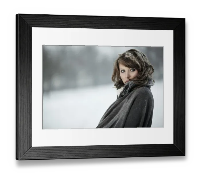 Framed Print : Young woman in snow, portrait