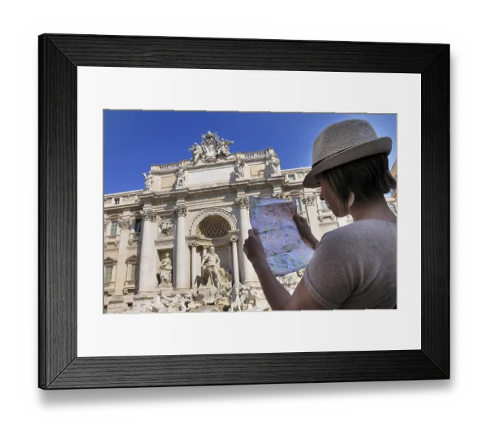 Framed Print : Female tourist with a map, in front of Trevi Fountain