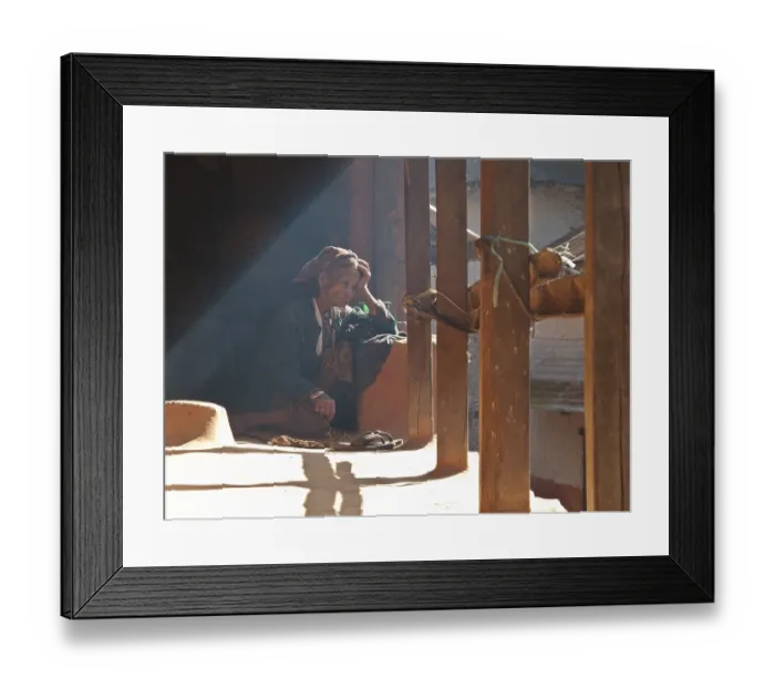 Framed Print : Old lady sitting on the terrace of her house Framed Print : Old lady sitting on the terrace of her house