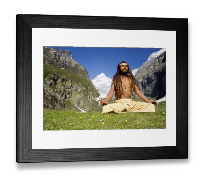 Framed Print : Shiva sadhu meditating next to his cave high above Badrinath