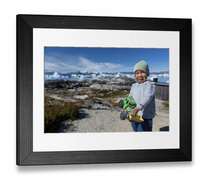 Framed Print : Young Inuit boy, Inuit settlement of Tiniteqilaaq
