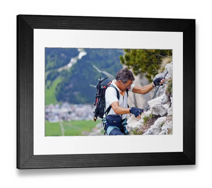 Framed Print : Mountaineer climbing the Stevia fixed rope route in Vallunga Framed Print : Mountaineer climbing the Stevia fixed rope route in Vallunga