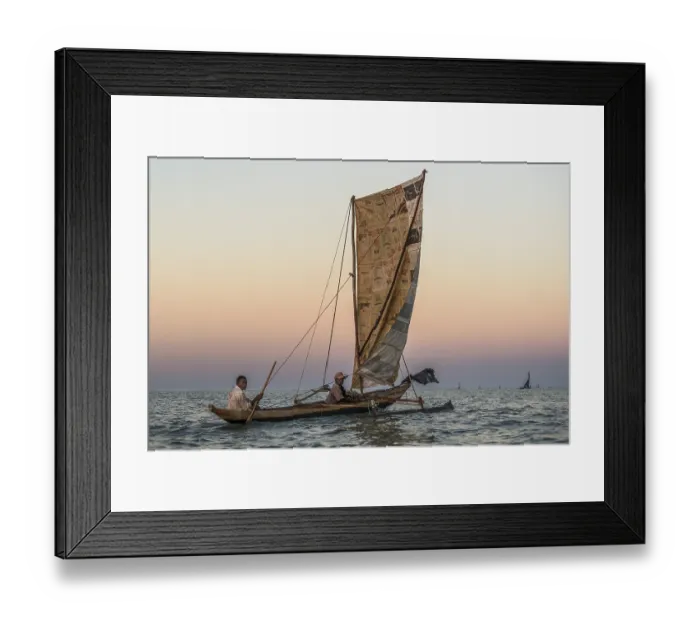 Framed Print : Fishermen at sunrise in traditional Pirogue outrigger boat on the Indian Ocean Framed Print : Fishermen at sunrise in traditional Pirogue outrigger boat on the Indian Ocean