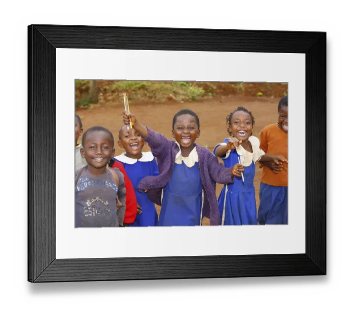 Framed Print : School children, 7, wearing school uniforms and looking forward to attending primary school