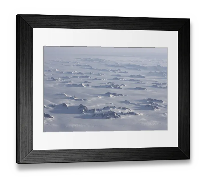 Framed Print : Aerial view, inland ice, ice sheet with glaciated mountain ranges Framed Print : Aerial view, inland ice, ice sheet with glaciated mountain ranges