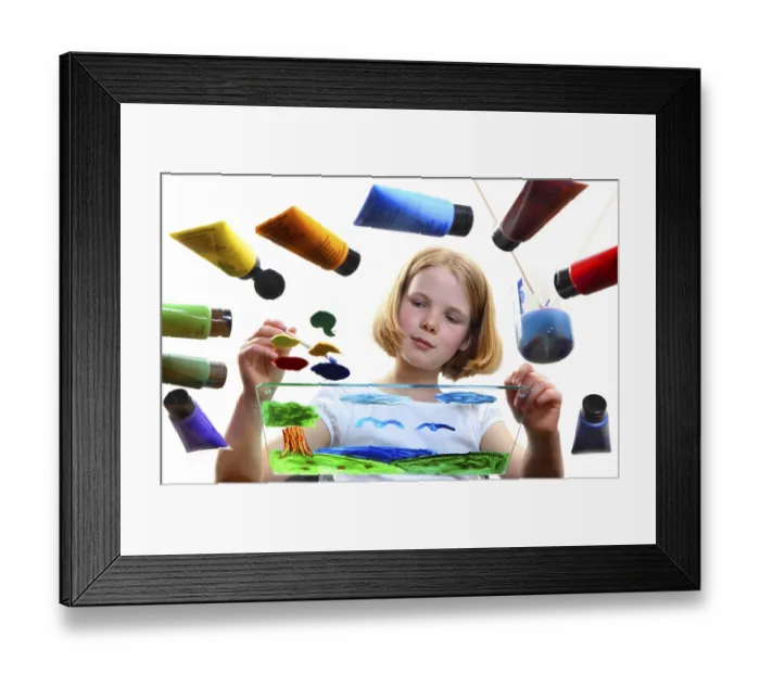 Framed Print : Girl, 11, painting a picture with acrylic colours