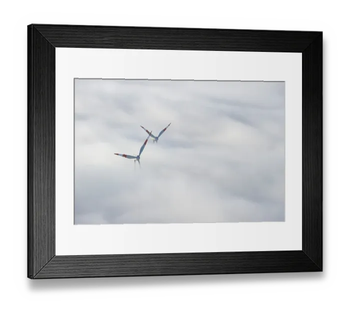 Framed Print : Wind turbines sticking out of the fog