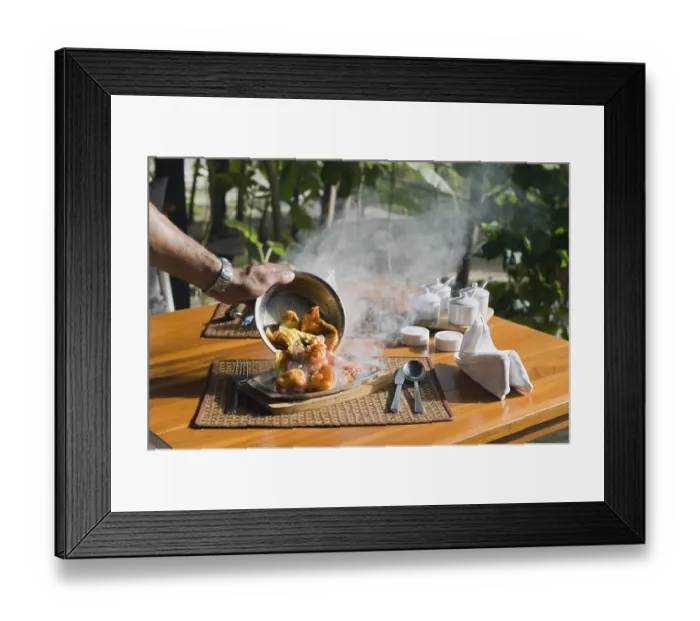 Framed Print : A hot plate with Thai food being served