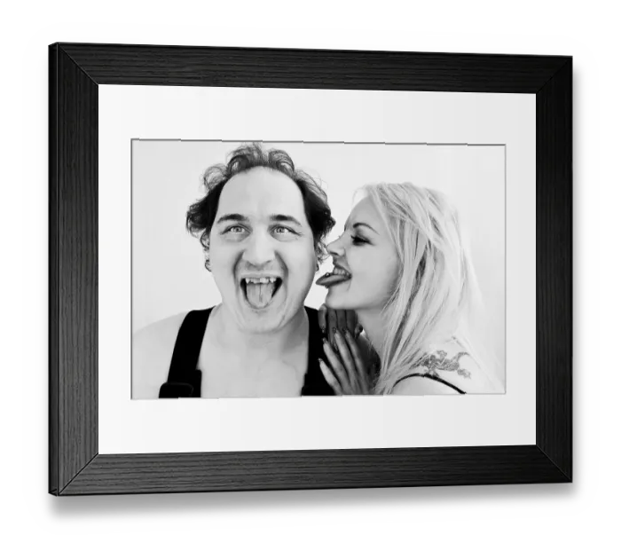 Framed Print : Man and woman sticking out their tongues Framed Print : Man and woman sticking out their tongues