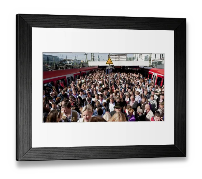 Framed Print : Many people on their way to the Wiesn or Oktoberfest grounds