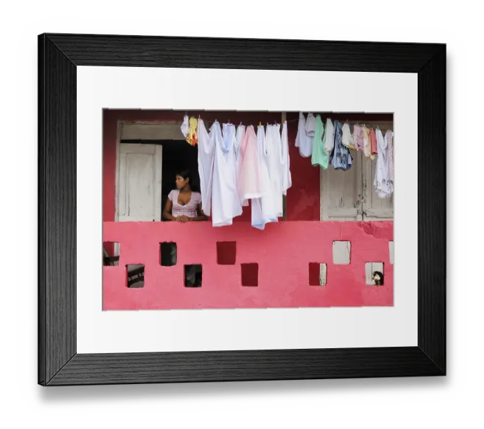 Framed Print : Woman next to washing on the line