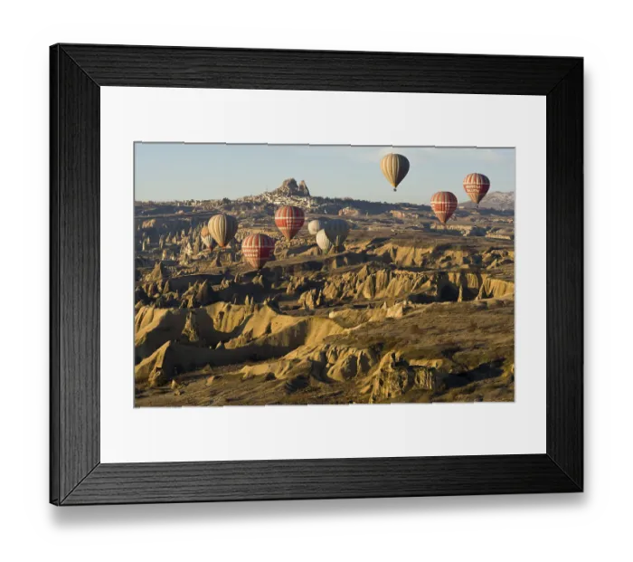 Framed Print : Hot air balloons in front of the Castle of Uchisar